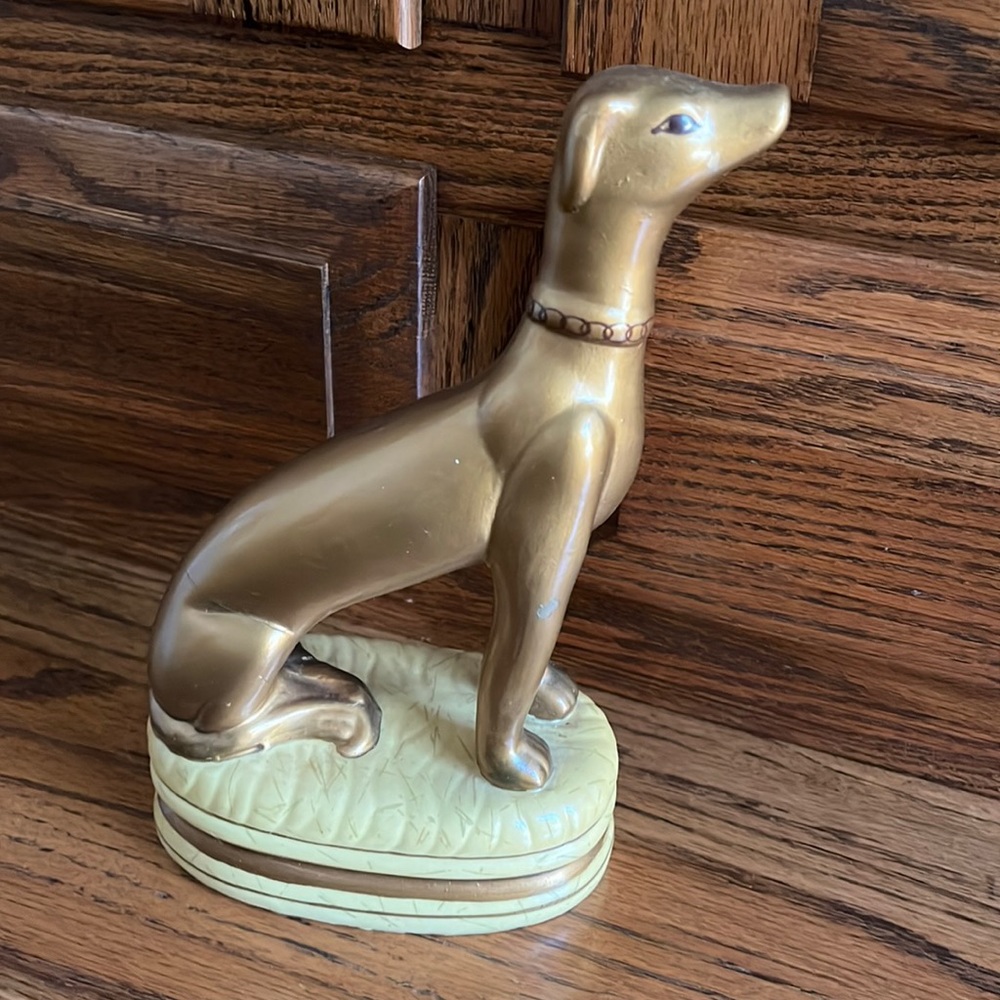 Small decorative dog.5”long by8 1/2” tall.
